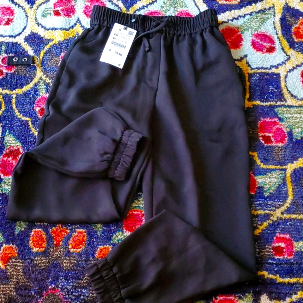 Black polyester pants with drawstring waste